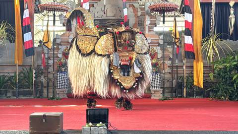       Barong mask and traditional stage in Bali.
  