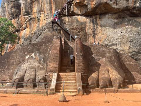 Famous Sigiriya Lion's Rock in Sri Lanka with steps leading up.