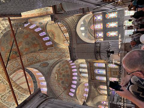 Interior of a richly decorated mosque.