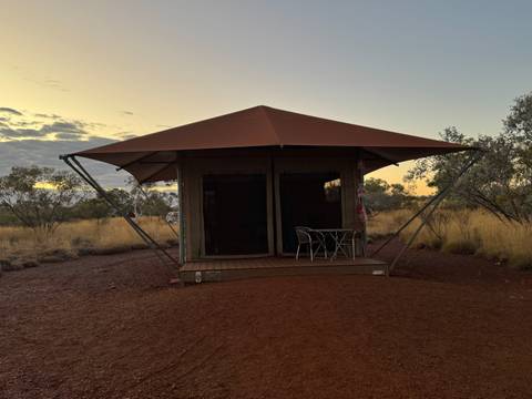 Glamping tent in the outback at sunrise.