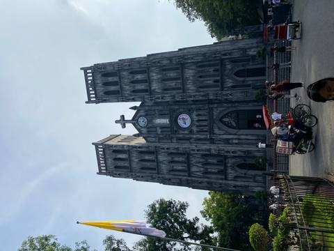       Large cathedral with intricate gothic architecture.
  