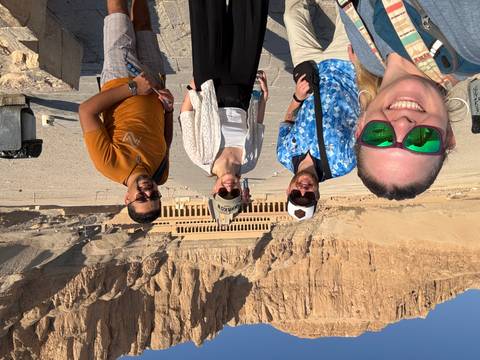 Group of tourists at archaeological site.