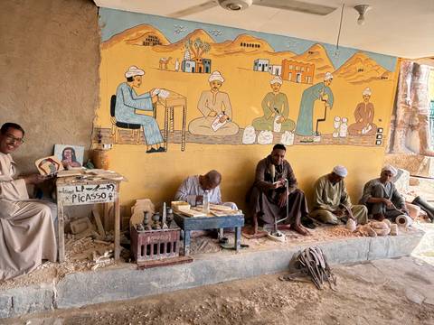 Local craftsmen working on their trade.