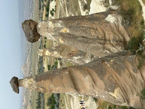 Unique rock formations resembling towers in Cappadocia.