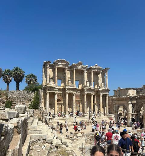 Ancient ruins with columns and arches, possibly Ephesus.