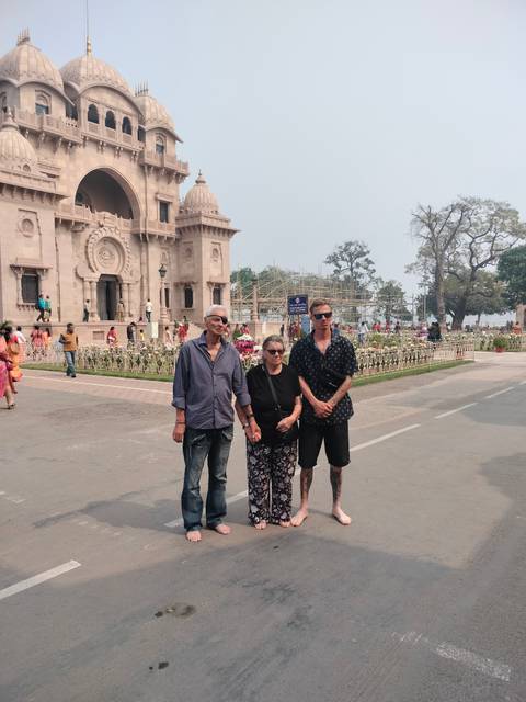Group of people exploring a historic site.
