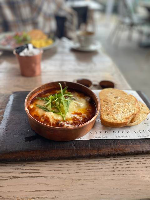       Rocky mountain landscape with cloudy sky.
  