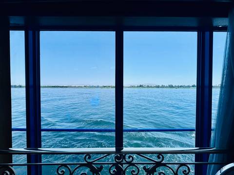       View of a river from a window.
  