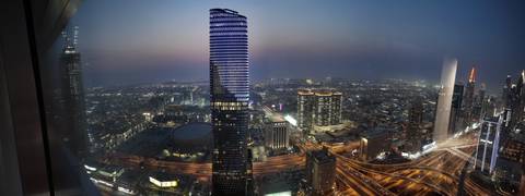 Twilight view of the city with skyscrapers.