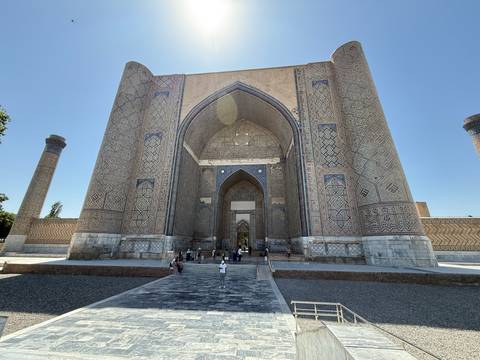      Front view of the Registan, a grand historical building.
  