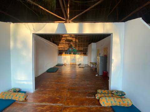 Open room with wooden flooring and minimal decor