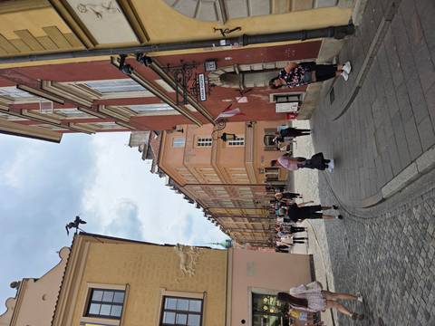 Narrow street lined with colorful buildings