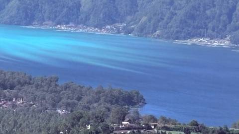       Lake view with mountains in the background.
  