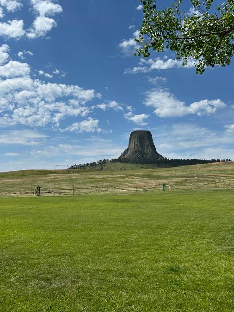       Devils Tower rising dramatically from the landscape.
  