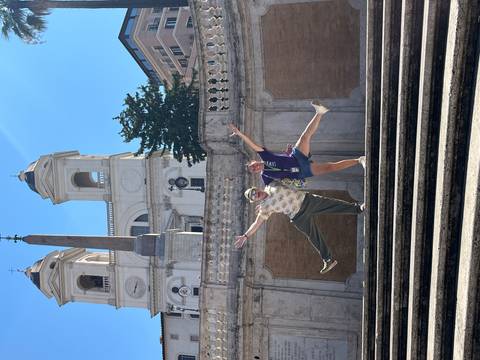       Two people posing on the Spanish Steps
  