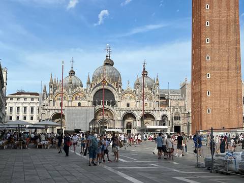       Crowd of people in front of St. Mark's Basilica
  