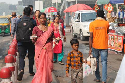 People walking in a busy street market