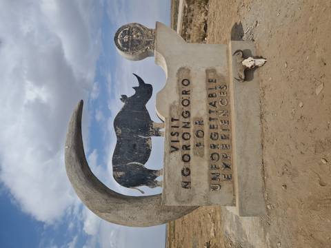 Sign for Ngorongoro Conservation Area with a rhino motif