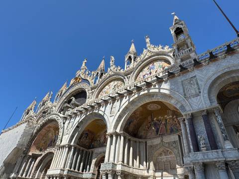 St. Mark's Basilica in Venice with detailed architecture.