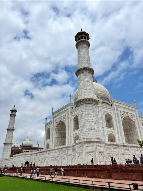 Taj Mahal with a blue sky in the background.