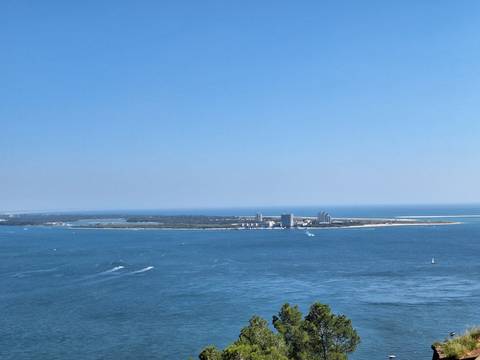 Scenic view of a peninsula with buildings.