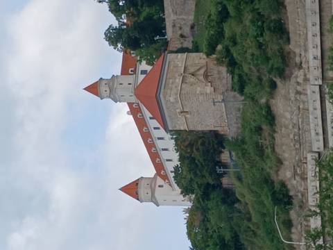 Bratislava Castle seen from a distance on a cloudy day.