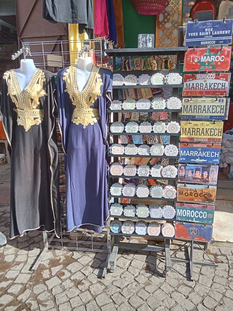       Street scene with classic tram and old building in Lisbon.
  