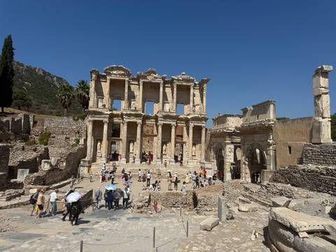 Celsus Library with tourists exploring the site.