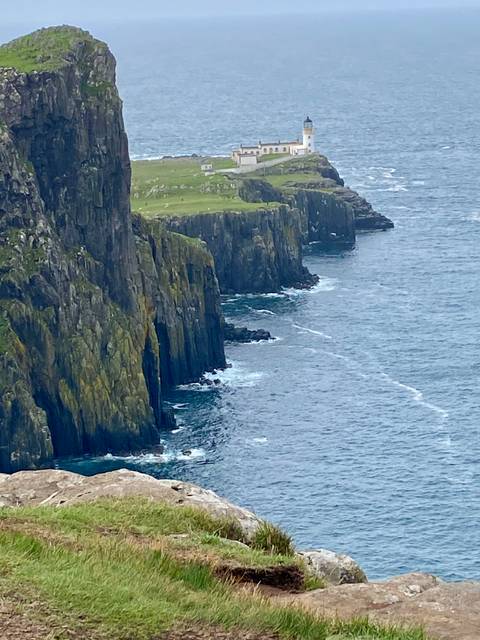 Sea cliffs with crystal blue water.