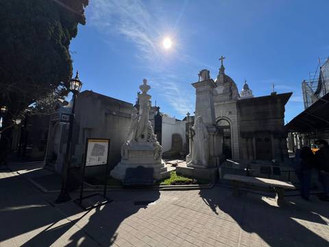       Cemetery with elaborate tombs and statues.
  