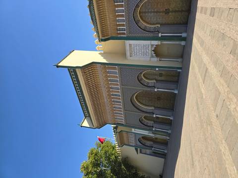 Impressive gate with intricate tile work and arches.