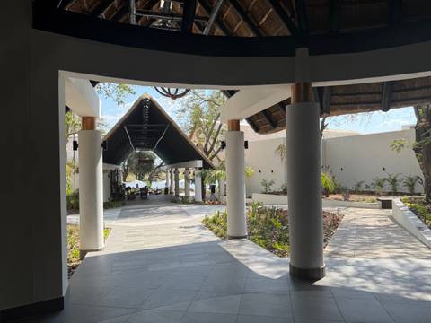 Architectural entrance with view of water.