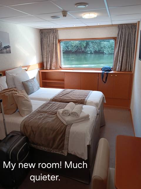 Twin-bedded room with a view of the river.