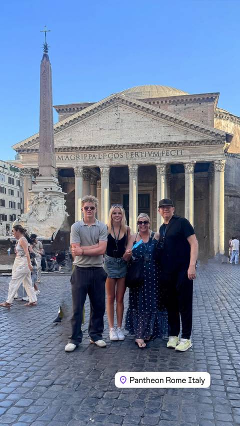 Family posing in front of the Pantheon in Rome.