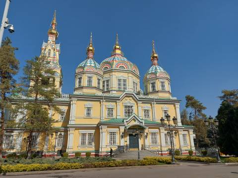 A colorful Orthodox cathedral with ornate domes.