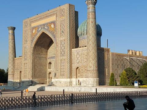 Ornately decorated Islamic architecture in a public square.