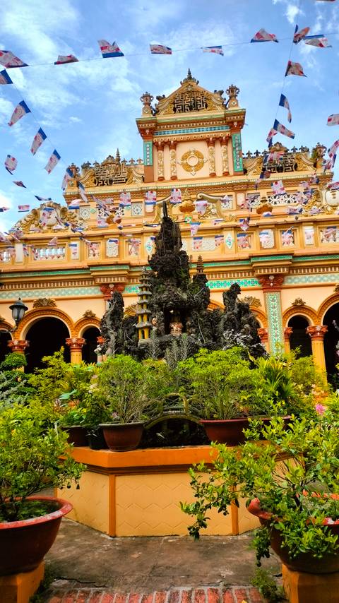      Ornate architectural detail with colorful frescoes.
  