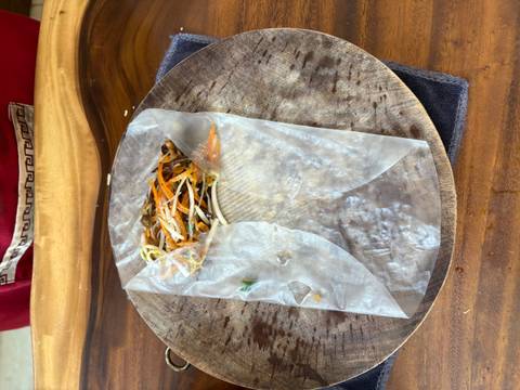       Filling mixture on rice paper ready for rolling.
  