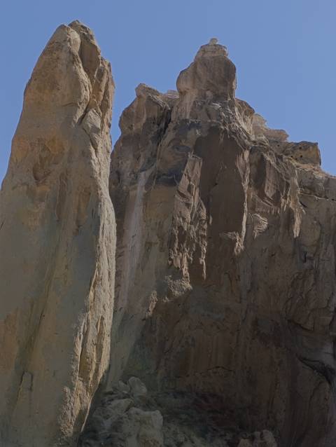       Close-up view of towering rock formations.
  