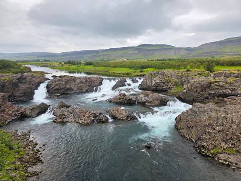 Hraunfossar, a series of waterfalls streaming over lava fields.