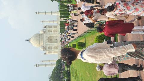 Tourists visiting the Taj Mahal.