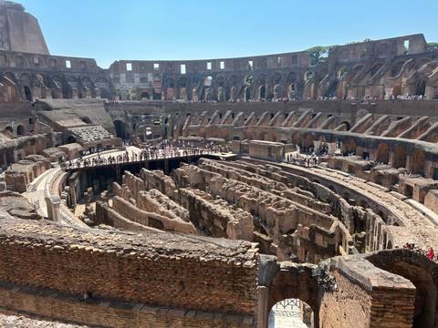 Interior of the Colosseum showing ruins.