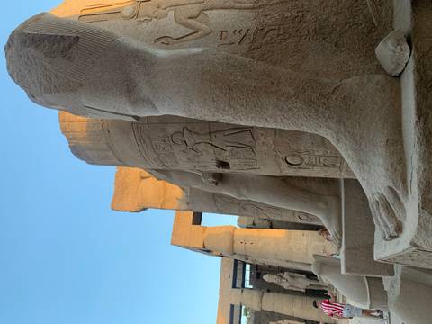 Close-up of ancient stone statues at a temple.