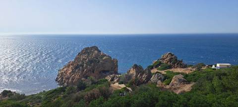       Rocky cliff overlooking the ocean
  