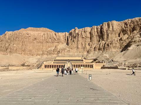 Group of people walking towards Hatshepsut Temple.