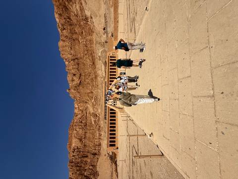 Tourists walking towards the Mortuary Temple of Hatshepsut.