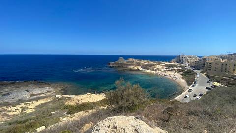 Scenic coastal landscape with a winding road.