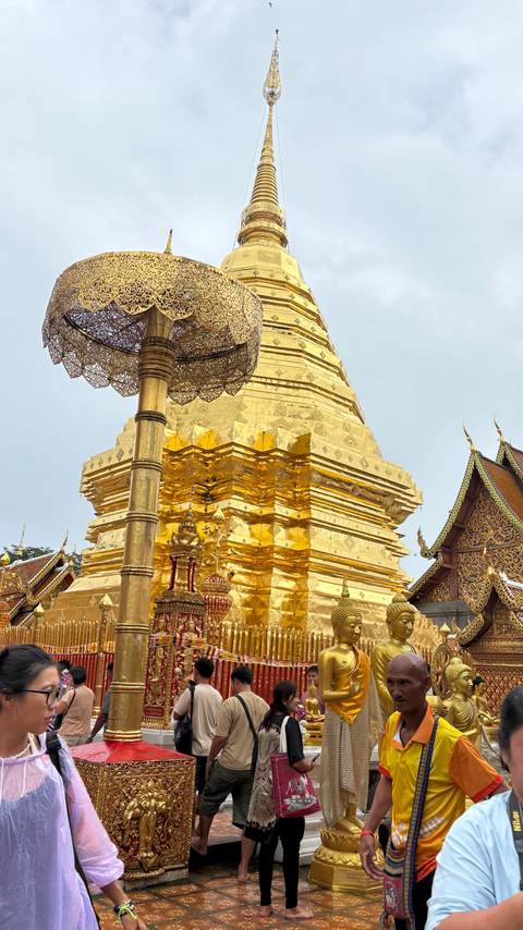 Golden temple structure with intricate decorations.