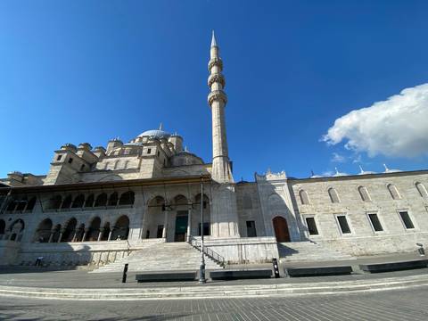       Ottoman-style mosque with a tall minaret.
  