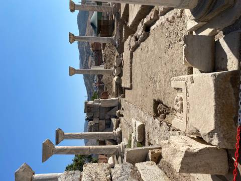 Ruins with columns and stone blocks.